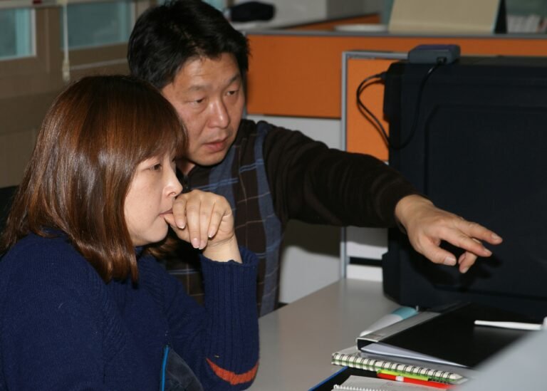 Image of a training session with salon staff learning to use POS software